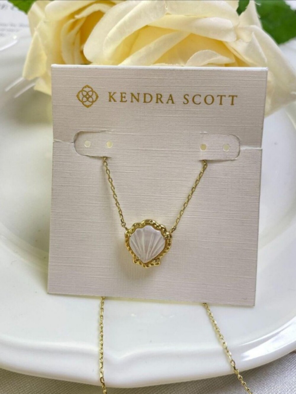 Kendra Scott Gold Necklace with White Shell-Style Pendant